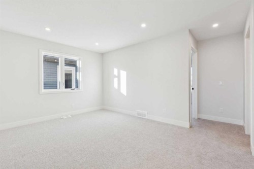 120 Quartz Crescent, Cochrane, AB - Indoor Photo Showing Other Room