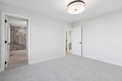 120 Quartz Crescent, Cochrane, AB - Indoor Photo Showing Other Room