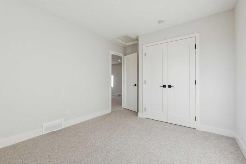 120 Quartz Crescent, Cochrane, AB - Indoor Photo Showing Other Room