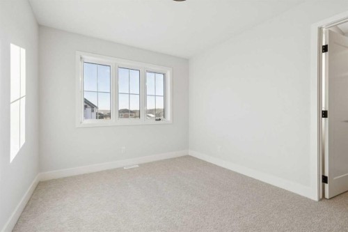 120 Quartz Crescent, Cochrane, AB - Indoor Photo Showing Other Room