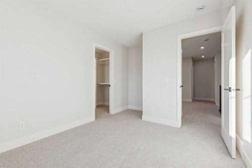 120 Quartz Crescent, Cochrane, AB - Indoor Photo Showing Other Room