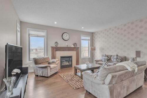 145 Walden Park Se, Calgary, AB - Indoor Photo Showing Living Room With Fireplace