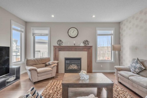 145 Walden Park Se, Calgary, AB - Indoor Photo Showing Living Room With Fireplace