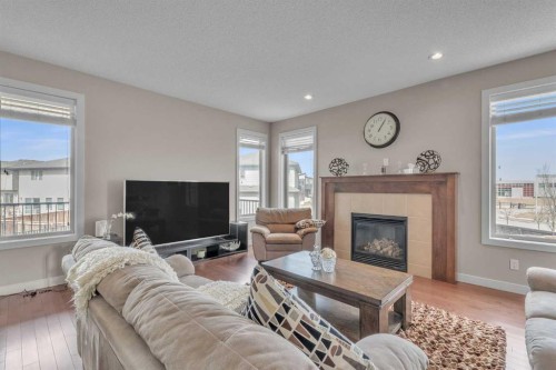 145 Walden Park Se, Calgary, AB - Indoor Photo Showing Living Room With Fireplace