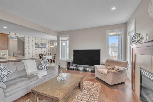 145 Walden Park Se, Calgary, AB - Indoor Photo Showing Living Room With Fireplace