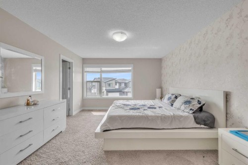 145 Walden Park Se, Calgary, AB - Indoor Photo Showing Bedroom