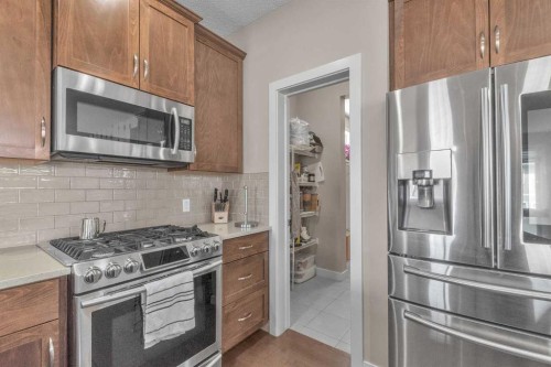 145 Walden Park Se, Calgary, AB - Indoor Photo Showing Kitchen With Upgraded Kitchen