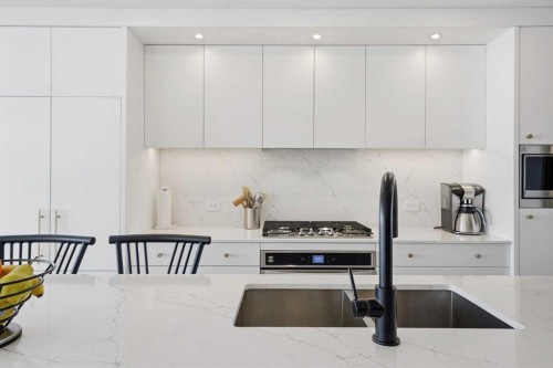 710-8505 Broadcast Avenue Sw, Calgary, AB - Indoor Photo Showing Kitchen With Upgraded Kitchen