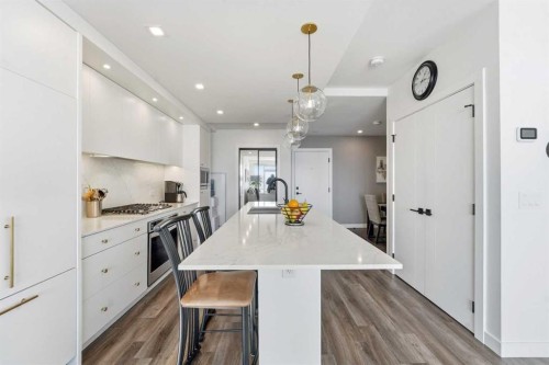 710-8505 Broadcast Avenue Sw, Calgary, AB - Indoor Photo Showing Kitchen With Upgraded Kitchen