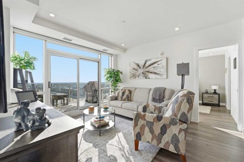 710-8505 Broadcast Avenue Sw, Calgary, AB - Indoor Photo Showing Living Room