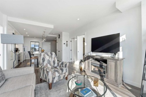 710-8505 Broadcast Avenue Sw, Calgary, AB - Indoor Photo Showing Living Room
