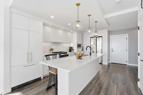 710-8505 Broadcast Avenue Sw, Calgary, AB - Indoor Photo Showing Kitchen With Upgraded Kitchen