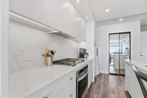 710-8505 Broadcast Avenue Sw, Calgary, AB - Indoor Photo Showing Kitchen With Upgraded Kitchen