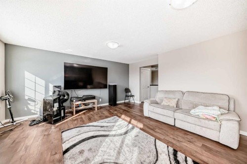46 Cranford Gardens Se, Calgary, AB - Indoor Photo Showing Living Room