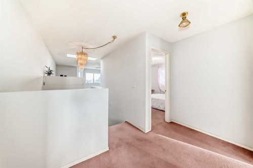 215 Appleglen Park Se, Calgary, AB - Indoor Photo Showing Other Room