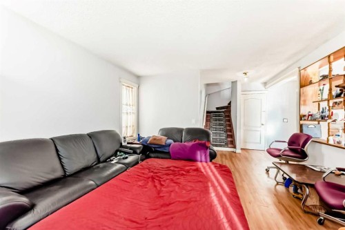 215 Appleglen Park Se, Calgary, AB - Indoor Photo Showing Living Room