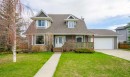 763 Stonehaven Drive, Carstairs, AB  - Outdoor With Deck Patio Veranda With Facade 