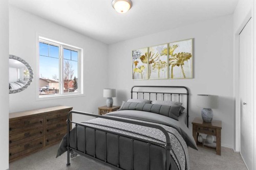763 Stonehaven Drive, Carstairs, AB - Indoor Photo Showing Bedroom