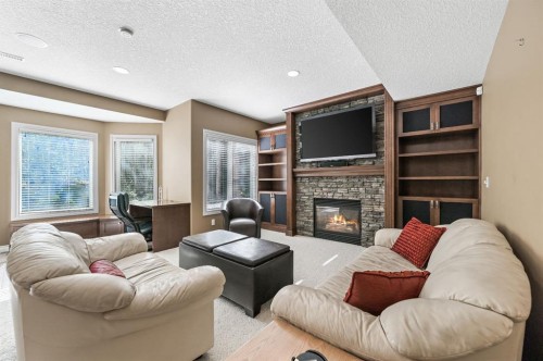 1458 Strathcona Drive Sw, Calgary, AB - Indoor Photo Showing Living Room With Fireplace