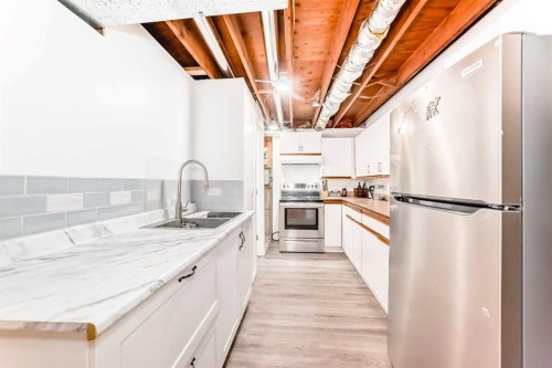 7139 18 Street Se, Calgary, AB - Indoor Photo Showing Kitchen With Stainless Steel Kitchen With Upgraded Kitchen
