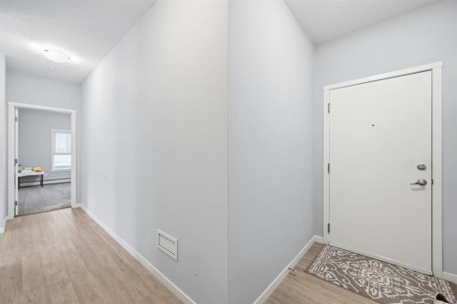 101-4250 Seton Drive Se, Calgary, AB - Indoor Photo Showing Other Room