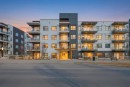 101-4250 Seton Drive Se, Calgary, AB  - Outdoor With Balcony With Facade 