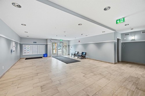 101-4250 Seton Drive Se, Calgary, AB - Indoor Photo Showing Other Room
