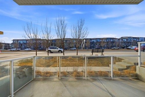 101-4250 Seton Drive Se, Calgary, AB - Outdoor With Balcony