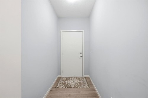 101-4250 Seton Drive Se, Calgary, AB - Indoor Photo Showing Other Room