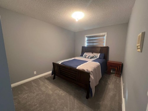 200 Hawkbury Close Nw, Calgary, AB - Indoor Photo Showing Bedroom
