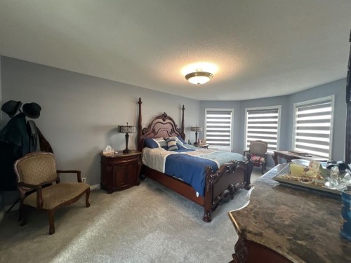 200 Hawkbury Close Nw, Calgary, AB - Indoor Photo Showing Bedroom