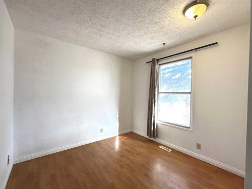 83 Falshire Way Ne, Calgary, AB - Indoor Photo Showing Other Room