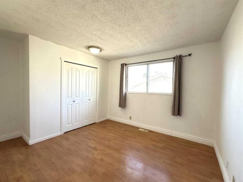 83 Falshire Way Ne, Calgary, AB - Indoor Photo Showing Other Room