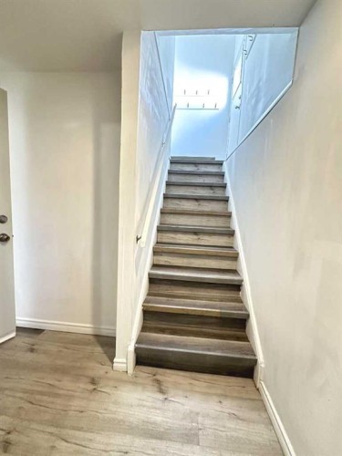 83 Falshire Way Ne, Calgary, AB - Indoor Photo Showing Other Room