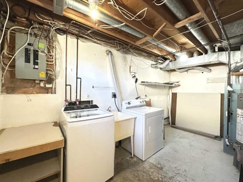 83 Falshire Way Ne, Calgary, AB - Indoor Photo Showing Laundry Room