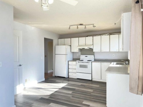 83 Falshire Way Ne, Calgary, AB - Indoor Photo Showing Kitchen With Double Sink