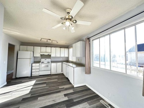 83 Falshire Way Ne, Calgary, AB - Indoor Photo Showing Kitchen