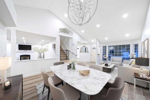 16 Sandringham Close Nw, Calgary, AB - Indoor Photo Showing Other Room With Fireplace