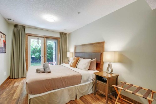 102-121 Kananaskis Way, Canmore, AB - Indoor Photo Showing Bedroom