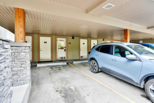 102-121 Kananaskis Way, Canmore, AB - Indoor Photo Showing Garage