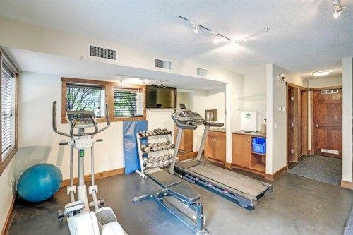 102-121 Kananaskis Way, Canmore, AB - Indoor Photo Showing Gym Room