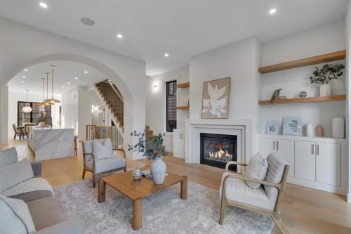 1904 48 Avenue Sw, Calgary, AB - Indoor Photo Showing Living Room With Fireplace