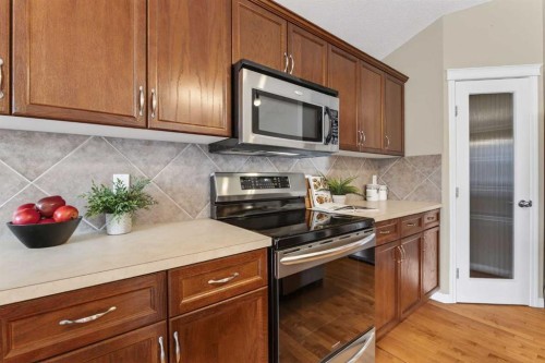 250 Silverado Plains Close Sw, Calgary, AB - Indoor Photo Showing Kitchen