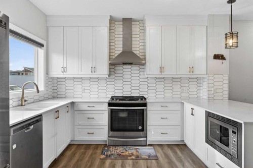 210 Cornerstone Crescent Ne, Calgary, AB - Indoor Photo Showing Kitchen With Stainless Steel Kitchen With Double Sink With Upgraded Kitchen