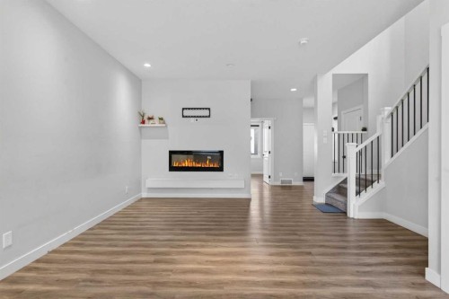 210 Cornerstone Crescent Ne, Calgary, AB - Indoor With Fireplace