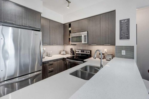 3101-175 Silverado Boulevard Sw, Calgary, AB - Indoor Photo Showing Kitchen With Stainless Steel Kitchen With Double Sink With Upgraded Kitchen