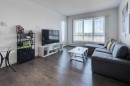 3101-175 Silverado Boulevard Sw, Calgary, AB  - Indoor Photo Showing Living Room 