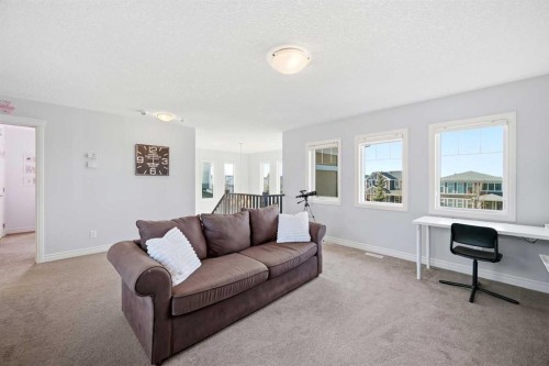 8 Redstone Passage Ne, Calgary, AB - Indoor Photo Showing Living Room