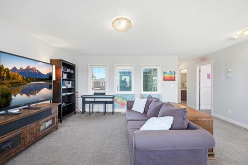 8 Redstone Passage Ne, Calgary, AB - Indoor Photo Showing Living Room