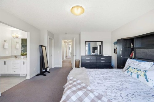 8 Redstone Passage Ne, Calgary, AB - Indoor Photo Showing Bedroom